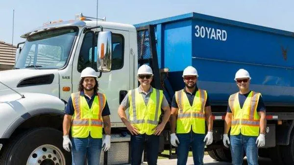 Licensed and insured Big Joey's Dumpster Rental crew with a roll-off truck in Dothan, AL